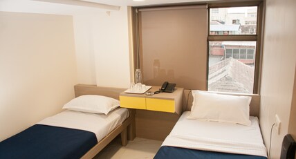 City Hotel Room Type - Economy Double Room (non - attached washroom) City Hotel Room Type - Economy Double Room (non - attached washroom)