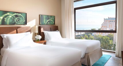 Sofitel Dubai The Palm, Resort and Spa Room Type - FAMILY TWO BEDROOM APARTMENT RESORT VIEW, 1 king bed and 2 Single beds, Fully equipped kitchen