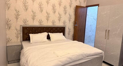 Cozy Stay by Drip Inn | Shukla Chauraha | Jankipuram Room Type - Deluxe Room