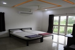Karkare Holiday Home | Rooms & Restaurant