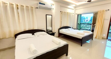 Beach Aura by Lavika Stays Room Type - Family Room