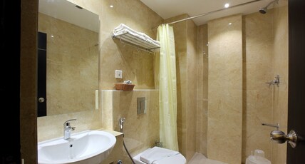 Park Residency Koyilandy Room Type - Deluxe AC Room Park Residency Koyilandy Room Type - Deluxe AC Room