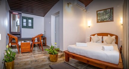 THE HOME RESIDENCY Room Type - Deluxe AC Room