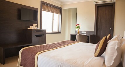 Hotel RG Inn Room Type - Deluxe Room