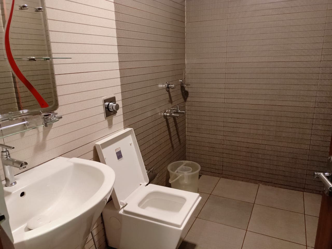 Guru Bhavan Inn - Tap to explore photos