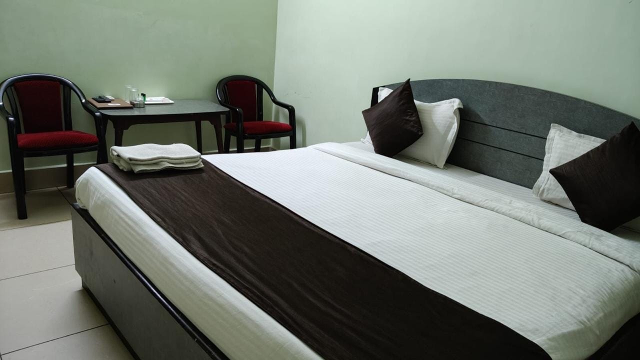 Hotel Durga - Tap to explore photos