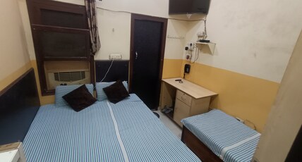 JAGRAJ GUEST HOUSE Room Type - STANDARD TRIPLE BED AC ROOM