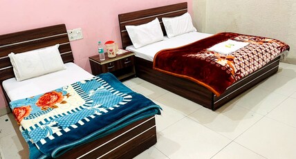 SHRI KAMAL DHAM Room Type - Deluxe Triple Bed Room