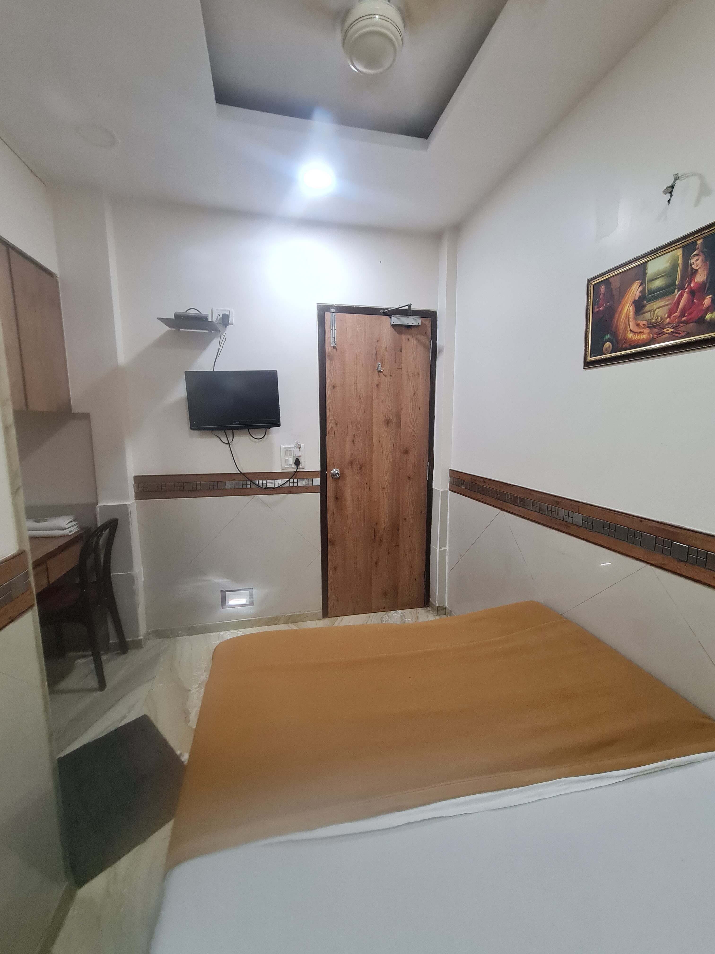 Hotel Sharda, Marine Lines - Tap to explore photos