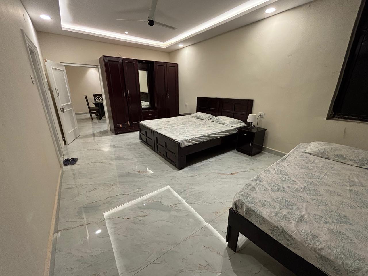 Visitors Lounge by MMG 3BHK Apartment First Floor - Tap to explore photos