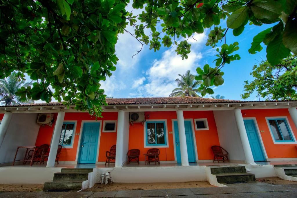 Papilio Beach Front Cottages - Tap to explore photos