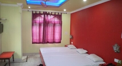K. Shree Guest House Room Type - Deluxe Triple Bed AC Room