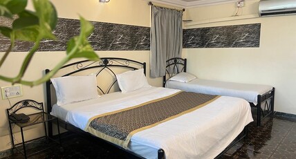 Hotel Sai's Village (101 meters from Saibaba Samadhi Temple) Room Type - Standard Triple Bed Non-AC (with Balcony)
