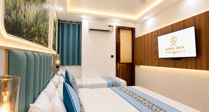 Hotel Arna Inn Room Type - Deluxe Triple Room Ideal for Family Stay
