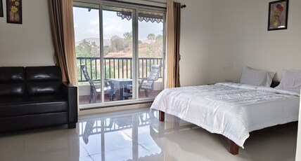 Divine stay inn Resort Room Type - Deluxe Room with Balcony