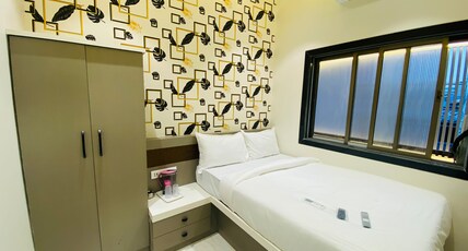 Hotel Rose Inn Room Type - Deluxe Room