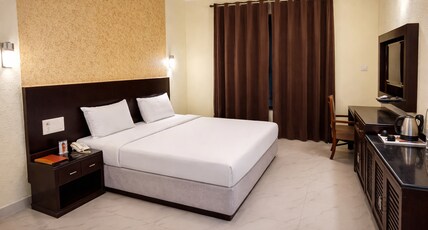 Hotel Uday Residency (Opp Radha Swami Satsang Beas) Room Type - Deluxe Room - King Bed