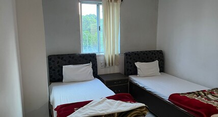 JYOTIGUEST house Room Type - Twin Bed Room AC