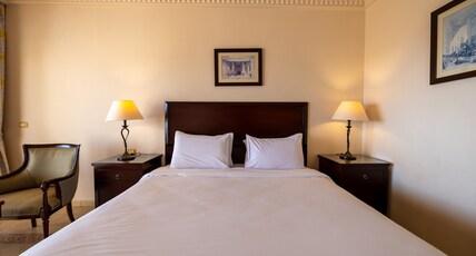 Continental Plaza Beach Resort Room Type - 1 King 2 Twin Family Room Garden View Balcony