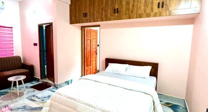 Radhika residency Room Type - Deluxe King Bed Room with Air Conditioning