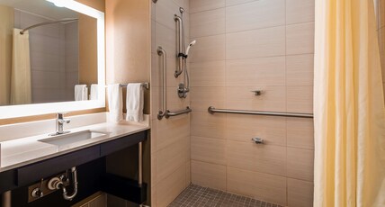 Best Western Premier University Inn Room Type - Accessible - 1 King, Mobility Accessible, Roll In Shower, Non-Smoking, Full Breakfast Best Western Premier University Inn Room Type - Accessible - 1 King, Mobility Accessible, Roll In Shower, Non-Smoking, Full Breakfast