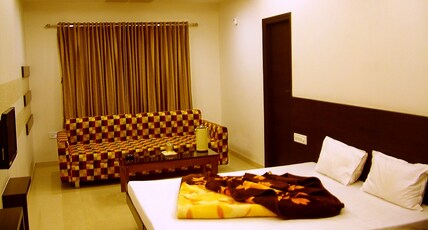 Hotel Rajmandir Room Type - Sofa cum Bed Non-AC Family room (Price is for 3 Adults) Hotel Rajmandir Room Type - Sofa cum Bed Non-AC Family room (Price is for 3 Adults)