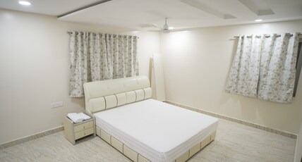 Stay Pride Service Apartments Vijayawada Room Type - City View Apartment Room