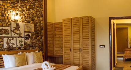 The Banyan Retreat By Excel Hotels & Resorts, Jim Corbett (Ramnagar) Room Type - PIKHAN SUITE WITH GARDEN VIEW The Banyan Retreat By Excel Hotels & Resorts, Jim Corbett (Ramnagar) Room Type - PIKHAN SUITE WITH GARDEN VIEW