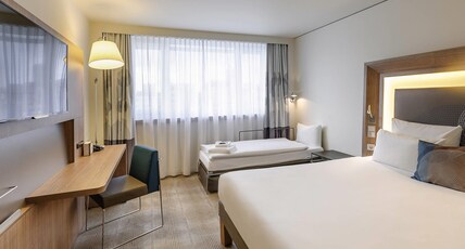 Novotel Munchen City Arnulfpark Room Type - Standard room with 1 double bed and sofa Novotel Munchen City Arnulfpark Room Type - Standard room with 1 double bed and sofa