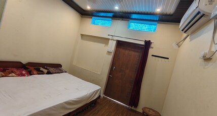 Tirupati Guest House Room Type - Deluxe Room 