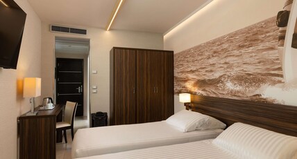 Mercure Rimini Lungomare Room Type - Classic room with two single beds and beautiful terrace Mercure Rimini Lungomare Room Type - Classic room with two single beds and beautiful terrace