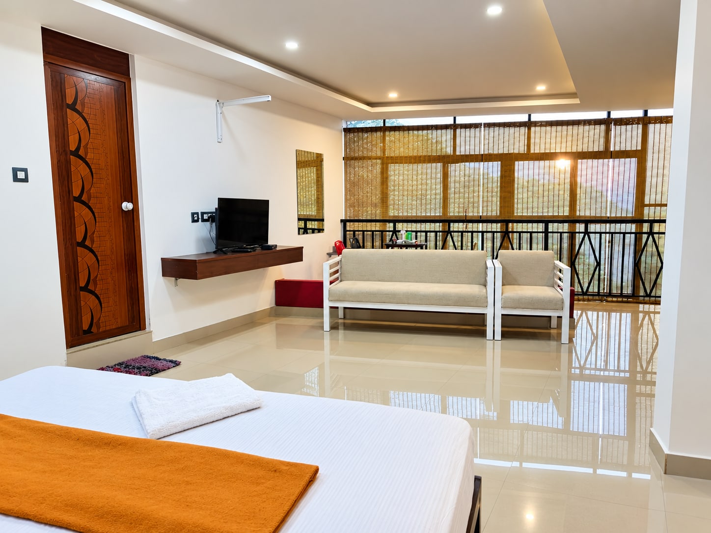 Grand Munnar Rooms - Tap to explore photos
