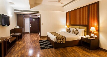 Legend Sarovar Portico Baddi Room Type - Deluxe Room with King Bed