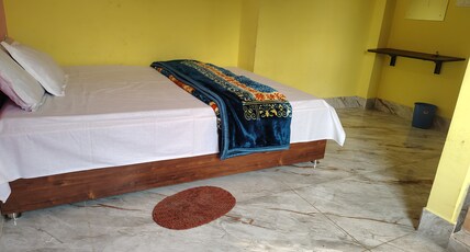 Shivmandir Homestay Room Type - Deluxe Double Room with Extra Bed