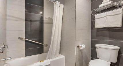 Best Western Plus Burnaby Hotel Room Type - 1 King Bed, Non-Smoking, Flat Screen Television, Work Desk, Full Kitchen, In-Room Safe, Sofabed, Ful Best Western Plus Burnaby Hotel Room Type - 1 King Bed, Non-Smoking, Flat Screen Television, Work Desk, Full Kitchen, In-Room Safe, Sofabed, Ful