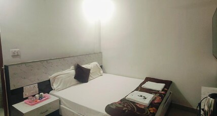 Hanuman Ji Guest house Room Type - Deluxe Room 102