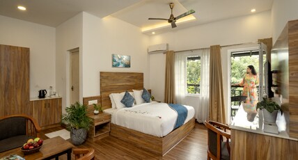 Munnar Ice Queen | Rooms & Cottages Room Type - Deluxe Room with Balcony
