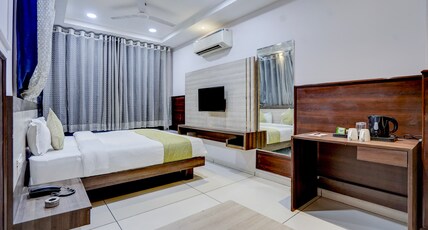 The Byke Express - Pishore Inn | (Pan India Pure Veg Hotel Chain) Room Type - Deluxe Room