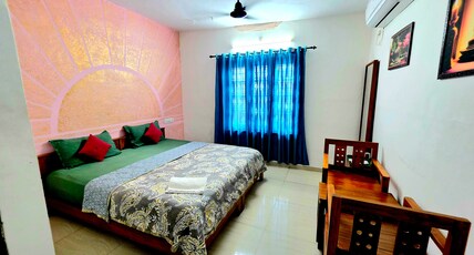 Red Poppy Home Stay Room Type - Deluxe AC Family Room