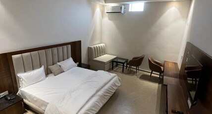 SURAJ INN HOTEL Room Type - Deluxe Room