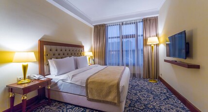 Ramada by Wyndham Almaty Room Type - City View Executive 1 King Bed Non-Smoking Suite Ramada by Wyndham Almaty Room Type - City View Executive 1 King Bed Non-Smoking Suite