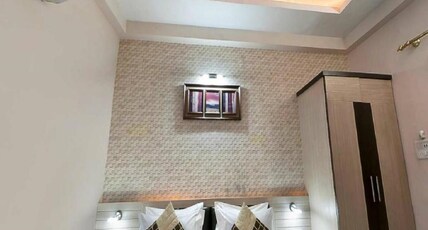 Om Sai Palace Room Type - Deluxe Room