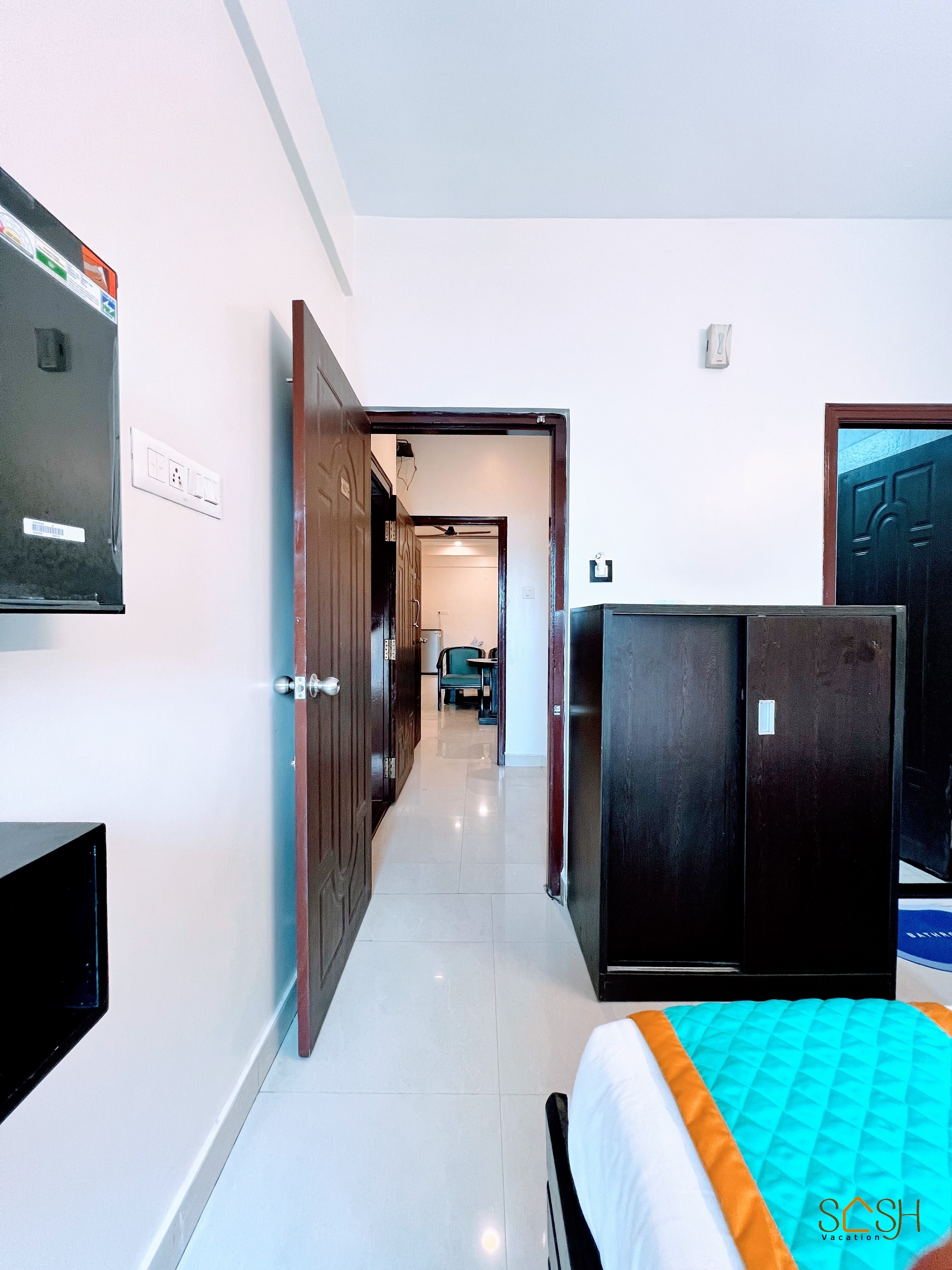 Elegant Queen Room with Private Balcony & AC - Tap to explore photos