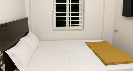Vasavi Palace Residency Room Type - Deluxe Double Room