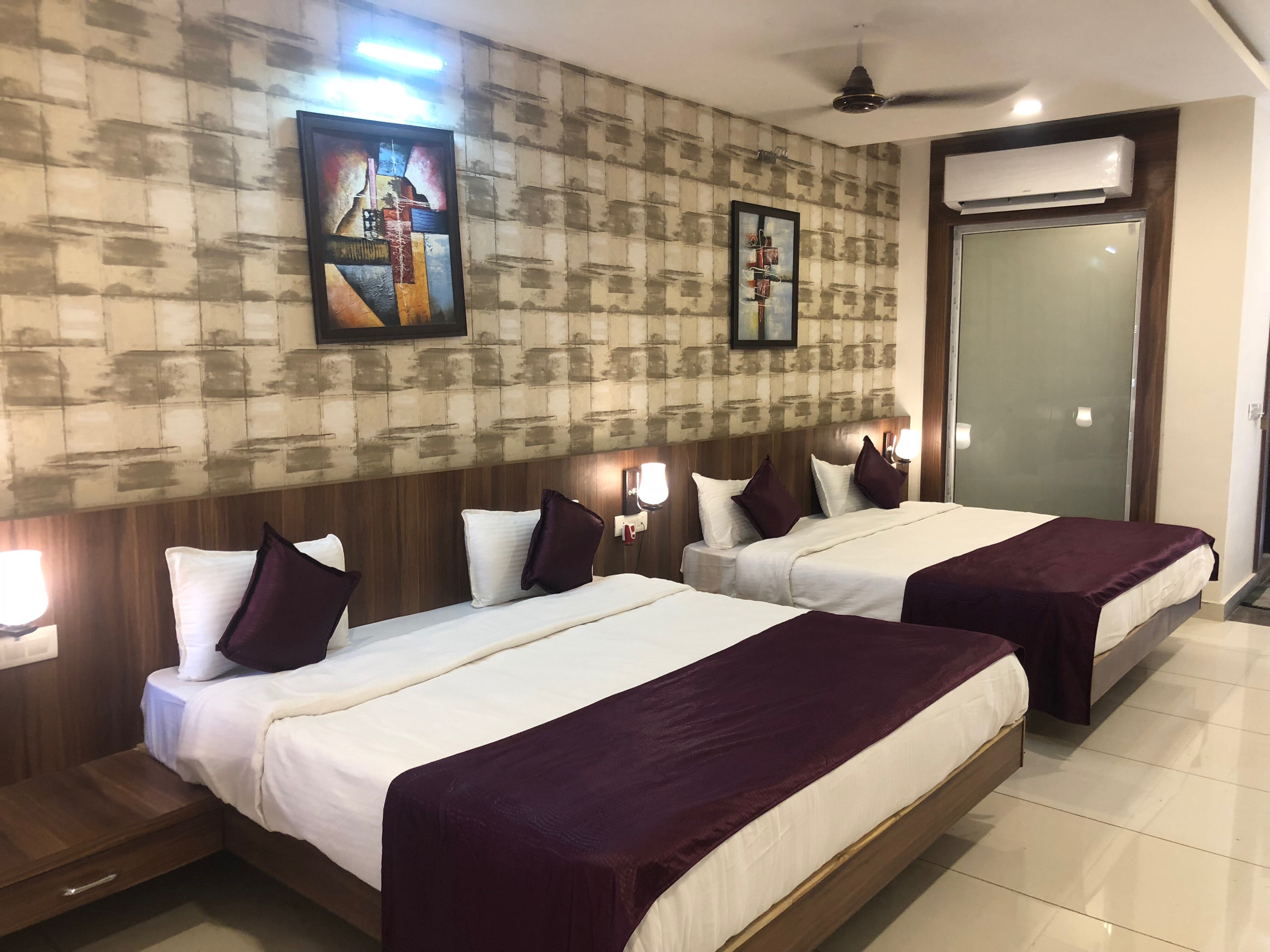Hotel Rishabh & The Flying Saucer, Air Bar and Restaurant - Tap to explore photos