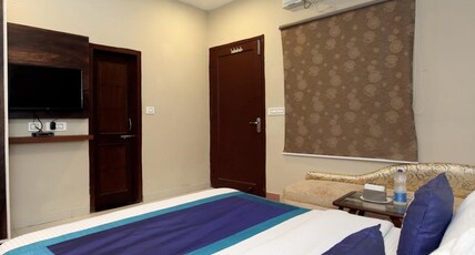 HOTEL SATKAR Room Type - Deluxe Room AC