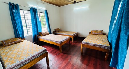LEVI HOME SILIGURI Room Type - AC Standard Quadruple Room