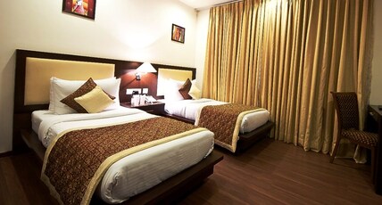 Divine Paradise Tavisha South Delhi Room Type - Deluxe Room with Smart TV