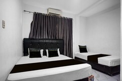 Hotel O near Masjid Raya Al-Mashun formerly Hotel Wisma Yuli