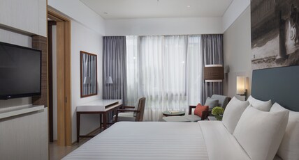 Courtyard by Marriott Bali Seminyak Resort Room Type - 1 Bedroom Suite 1 King, Pool view, Balcony Courtyard by Marriott Bali Seminyak Resort Room Type - 1 Bedroom Suite 1 King, Pool view, Balcony